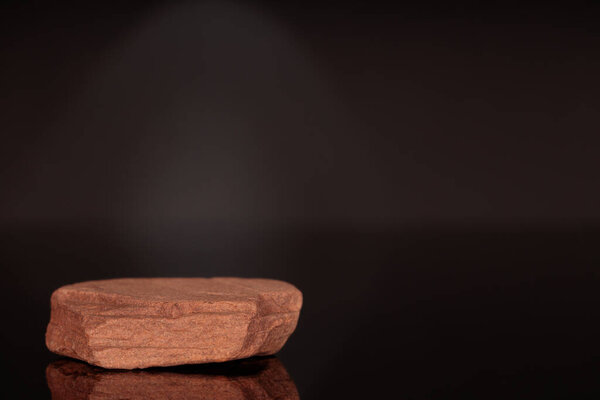 Rock podium on the white background. Stone podest for product, cosmetic presentation. Creative mock up.