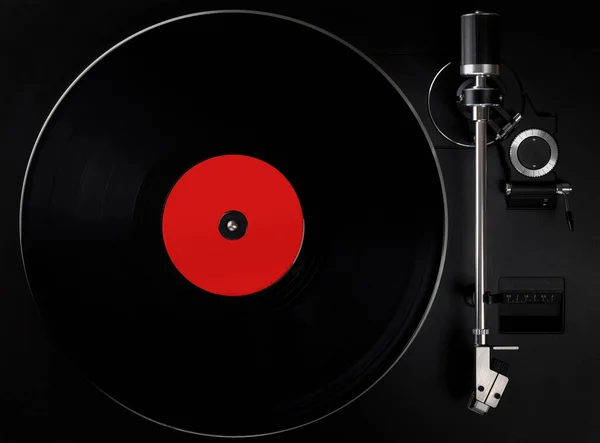 黑色转盘播放乙烯唱片 空白标签 旧式转盘的顶部视图 — 图库照片