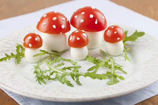 Tomato and egg fly agaric mushrooms — Stock Photo, Image
