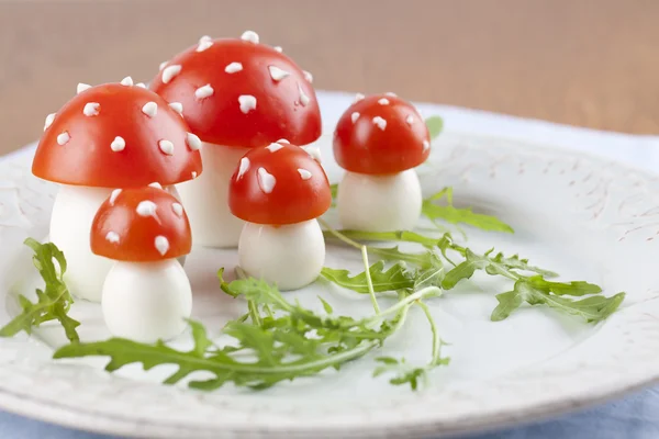 Tomato and egg fly agaric mushrooms — Stock Photo, Image