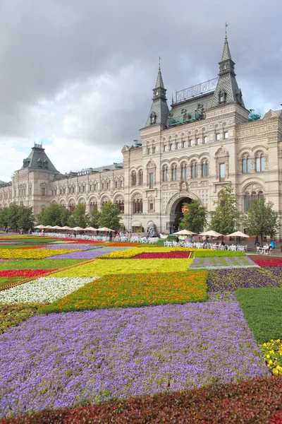 Flower beds against GUM mall building in Moscow.