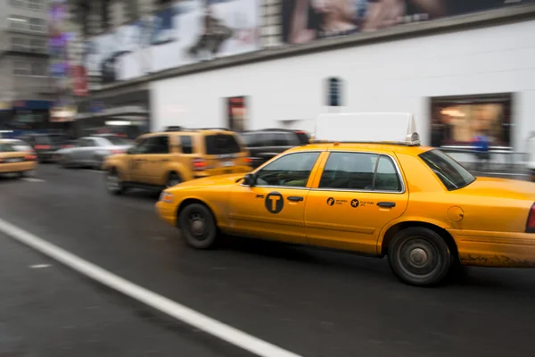 Desfoque de táxi amarelo — Fotografia de Stock