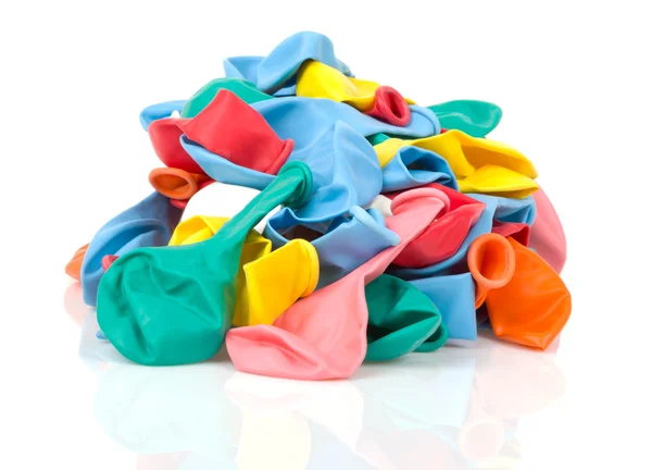 Heap of colorful empty balloons, isolated on white — Stock Photo, Image