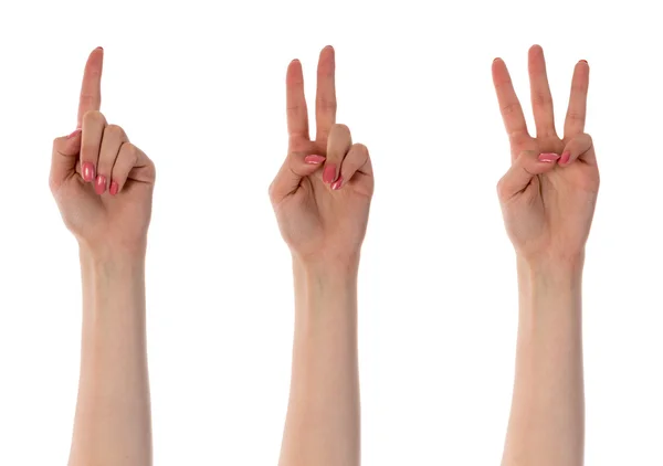 Três contando as mãos femininas isoladas no branco — Fotografia de Stock