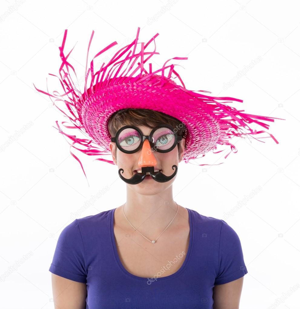 Woman with funny carnival mask and hat