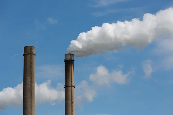 Industrial smoke stacks of a power plant. — Stock Photo, Image