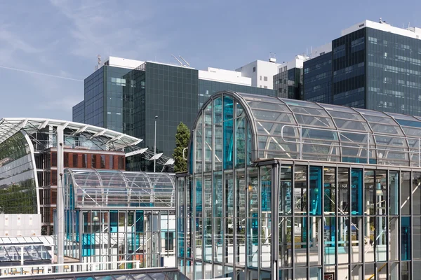 Subway station with office buildings in Amsterdam, capital city of the Netherlands — Stock Photo, Image