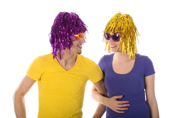 Happy man and woman with wigs and sunglasses — Stock Photo, Image