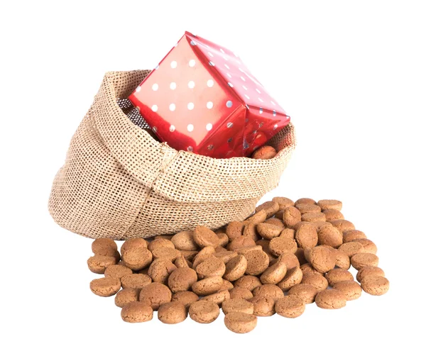 Jute bag with ginger nuts and presents, a Dutch tradition at Sinterklaas event in december Royalty Free Stock Images