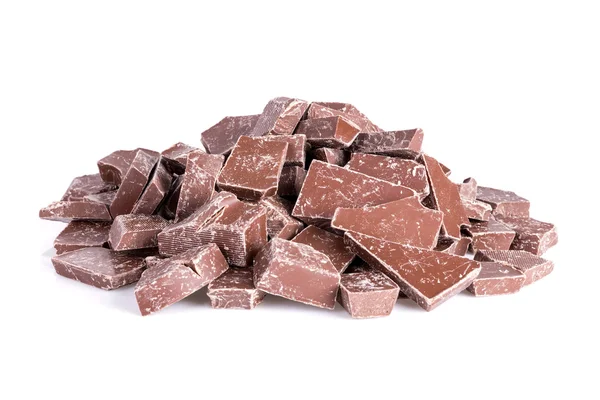 Mucchio di pezzi di cioccolato sopra bianco — Foto Stock