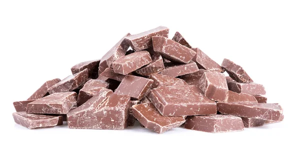 Mucchio di pezzi di cioccolato sopra bianco — Foto Stock