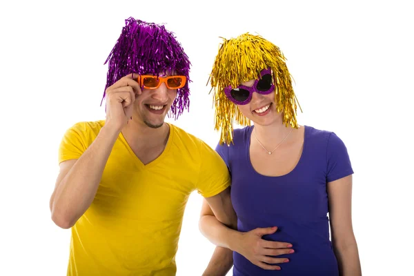 Man and woman with sunglasses and carnival wigs — Stock Photo, Image