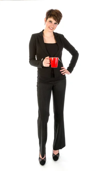 Slender businesswoman wit a cup of coffee — Stock Photo, Image