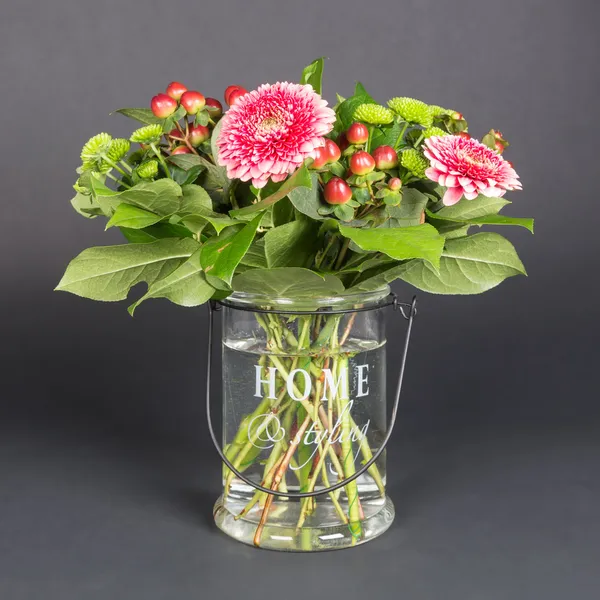 Bouquet of flowers in glass vase — Stock Photo, Image