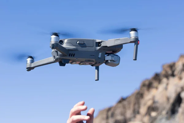 Man Hand Launching Drone Blue Sky — Foto de Stock