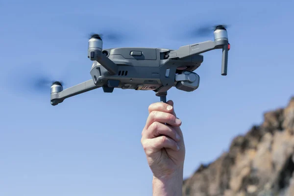Man Hand Launching Drone Blue Sky — Foto de Stock
