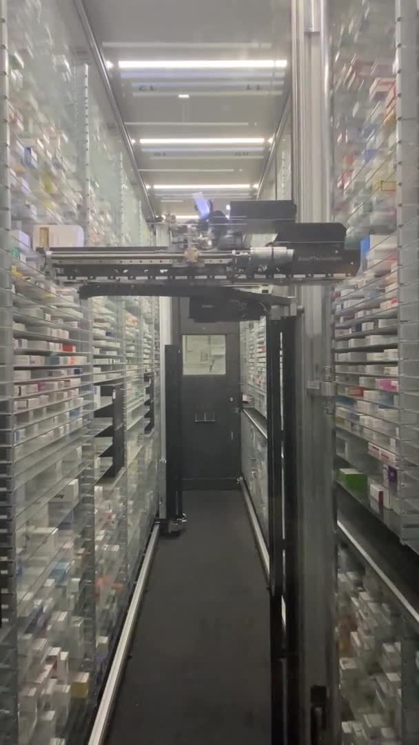 Rome Italy Vertical Video Automatic Pick Place Robot Pharmacy Warehouse — Stock Video