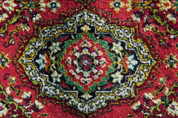 A carpet is decorated by a folk decorative pattern — Stock Photo, Image