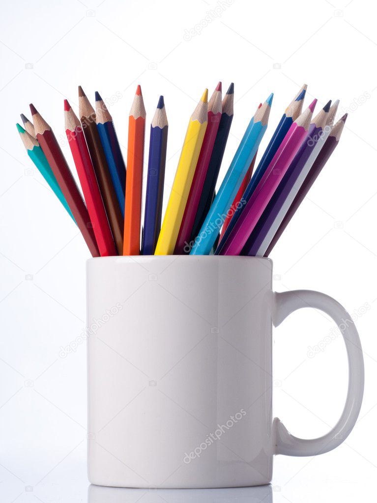 Various colour pencils in cup.
