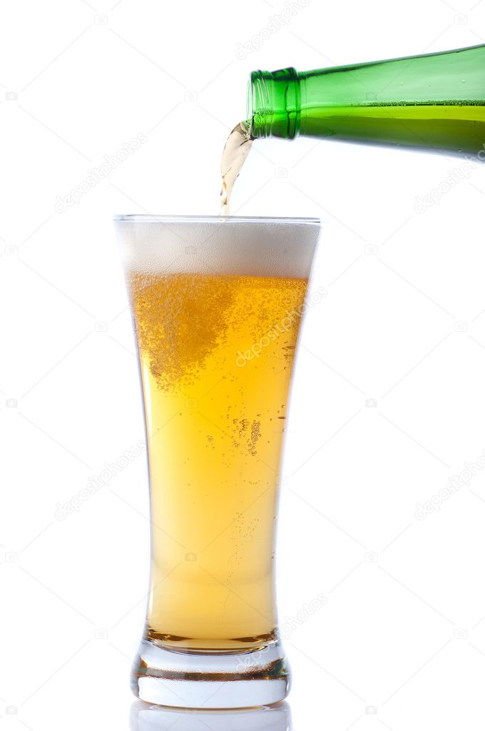 Beer pouring from bottle into glass on white Stock Photo by ©Vbashutskyy 20195287