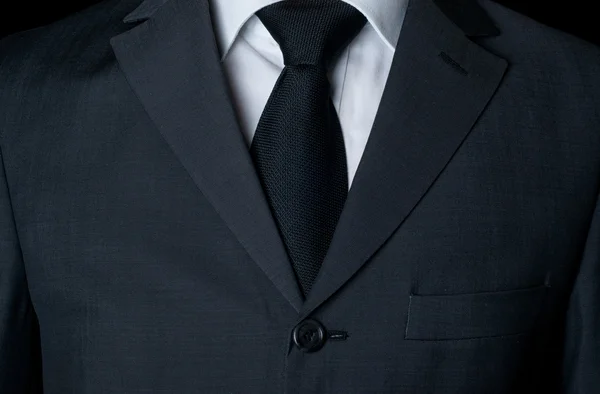 Traje de negocios oscuro con corbata —  Fotos de Stock