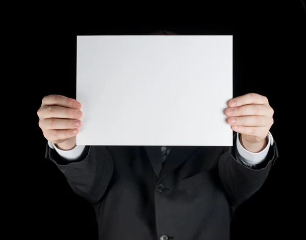 Businessman holds a paper — Stock Photo, Image
