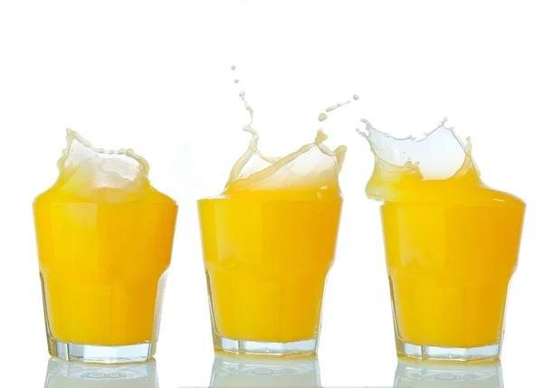 Orangensaft splash Collection auf einem weißen — Stockfoto