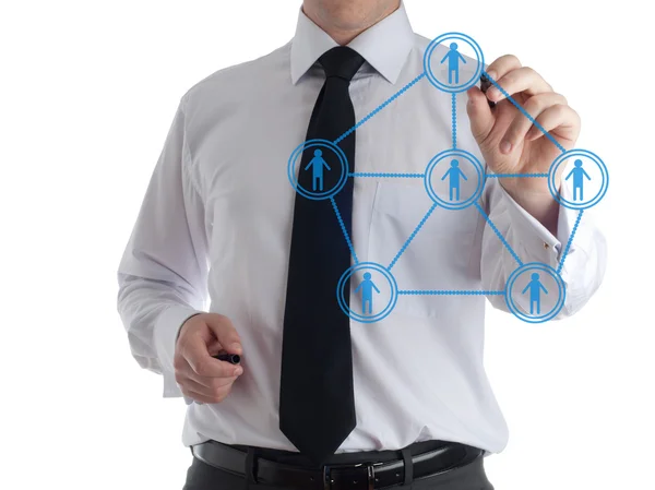 Homem de negócios em um quadro de desenho um esquema de rede de negócios sociais — Fotografia de Stock