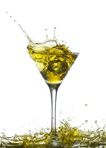 Yellow cocktail with splashes — Stock Photo, Image