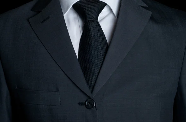 Traje de negocios oscuro con corbata —  Fotos de Stock