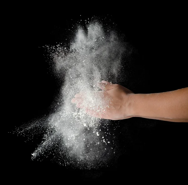 Freeze motion of dust explosion in hands — Stock Photo, Image