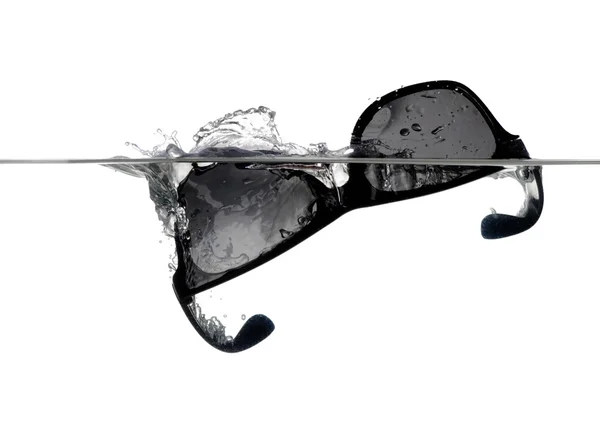 Sunglassessplashing in water isolated on white — Stock Photo, Image