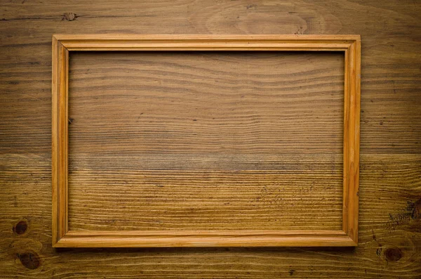 Παλιό ξύλινο πλαίσιο σε ξύλο φόντο — Φωτογραφία Αρχείου