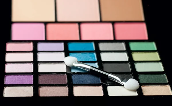 Make-up colorful eyeshadow palettes close up — Stock Photo, Image