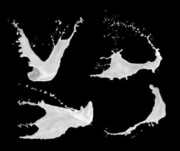 Spruzzi di latte sulla superficie nera — Foto Stock