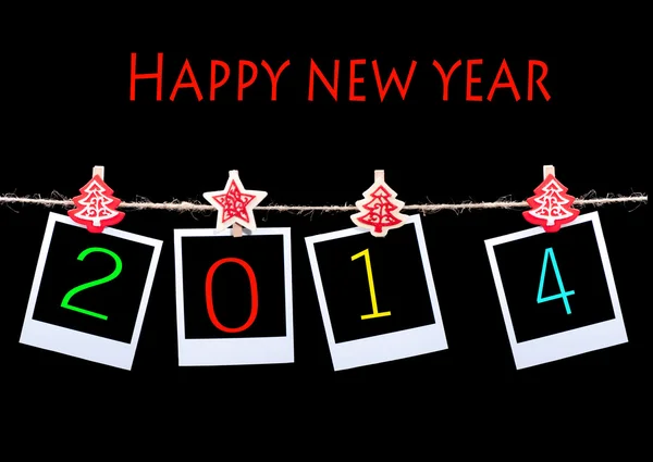 New year 2014 Blank photos hanging on rope — Stock Photo, Image