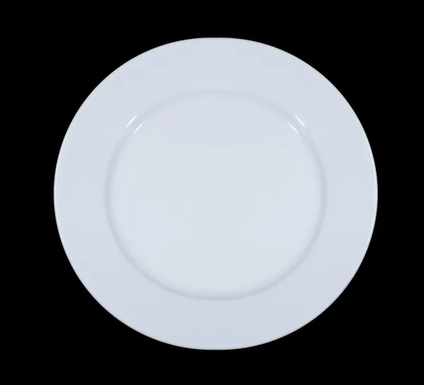 Empty white plate on wooden table — Stock Photo, Image