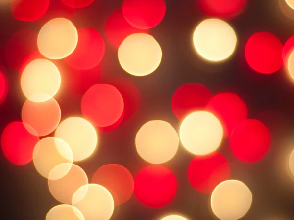 Lichte gloeiende lichten rood en gele achtergrond — Stockfoto