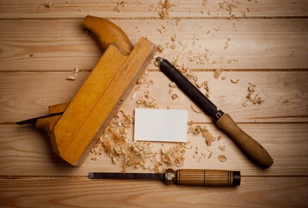 Herramientas de carpintería sobre fondo de madera —  Fotos de Stock