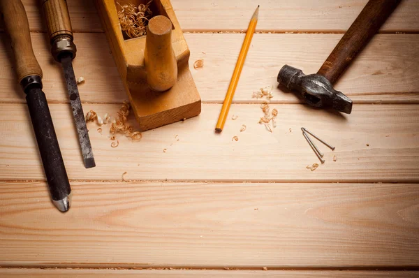 Conjunto de herramientas sobre un panel de madera con espacio para texto —  Fotos de Stock