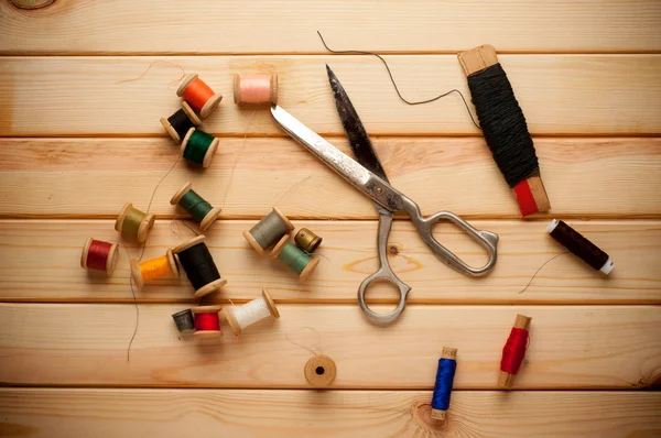 Vintage Background with sewing tools and on the wooden background — Stock Photo, Image