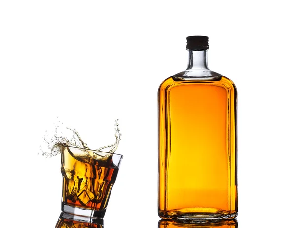 Isolated shots of whiskey with splash on white — Stock Photo, Image