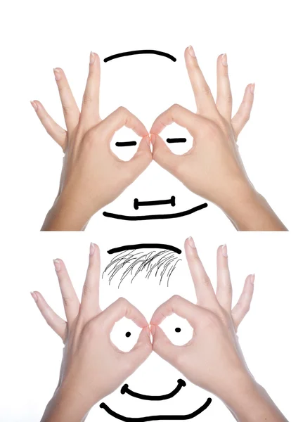Menschliches Gesicht, die Hände gemacht — Stockfoto