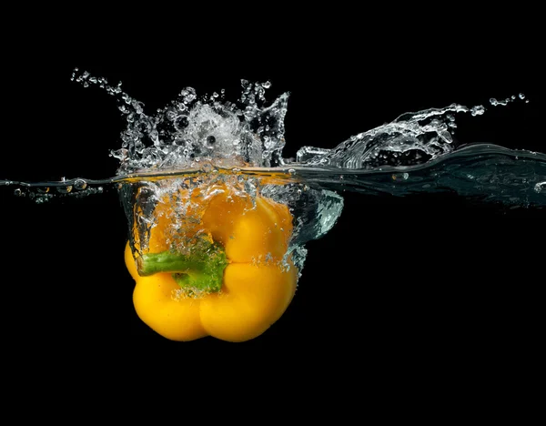 Pepper splash in water — Stock Photo, Image