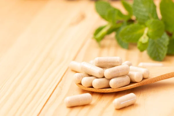 Suplementos Vitamínicos Cuchara Sobre Mesa Madera — Foto de Stock