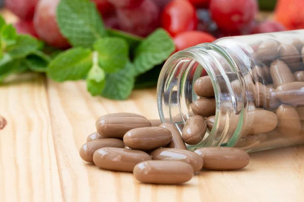 Brown Vitamins Supplements Wooden Table Variety Fruit — Foto de Stock