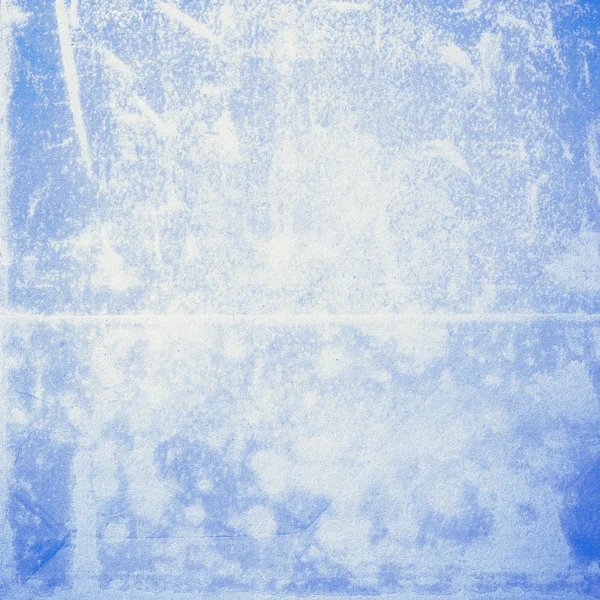 Текстура голубой бумаги с белыми царапинами — стоковое фото