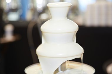 White chocolate fountain for fondue clipart
