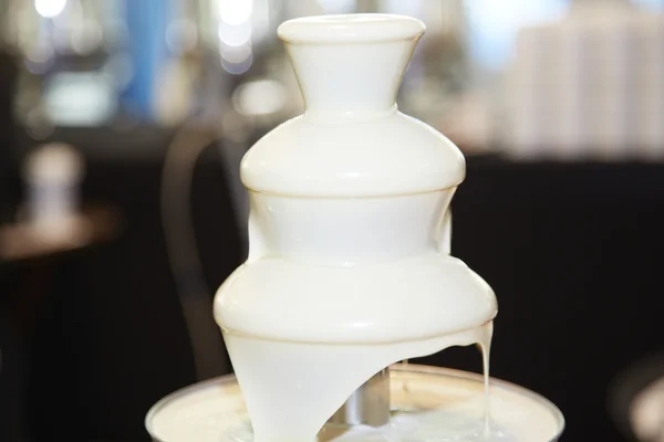 White chocolate fountain for fondue — Stock Photo, Image