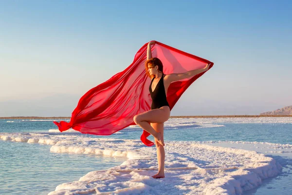 Fitness dance class woman dancing at the Dead sea, Israel